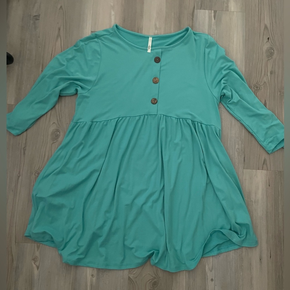 Baby doll style tunic with pockets